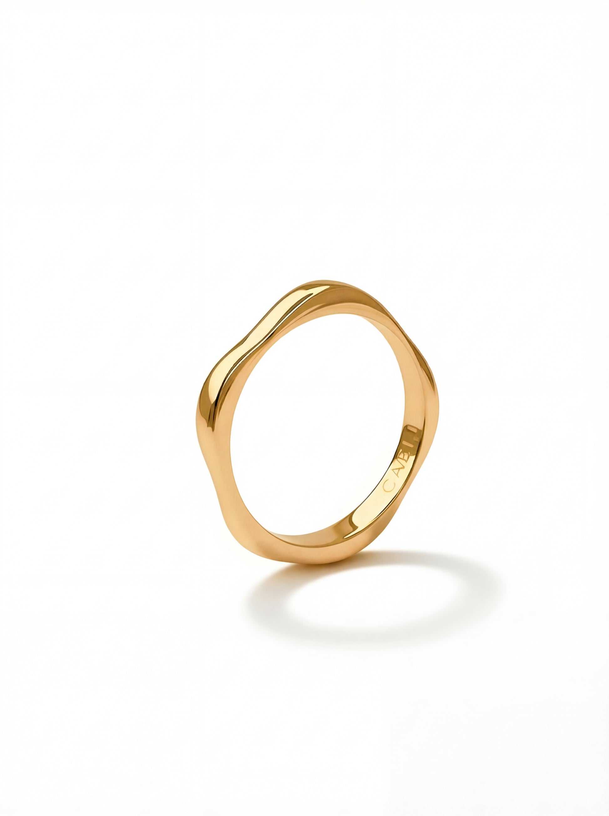Quiet Curve Ring organic wavy band 14K gold plated 316L surgical steel hypoallergenic Caeli Jewelry limited edition