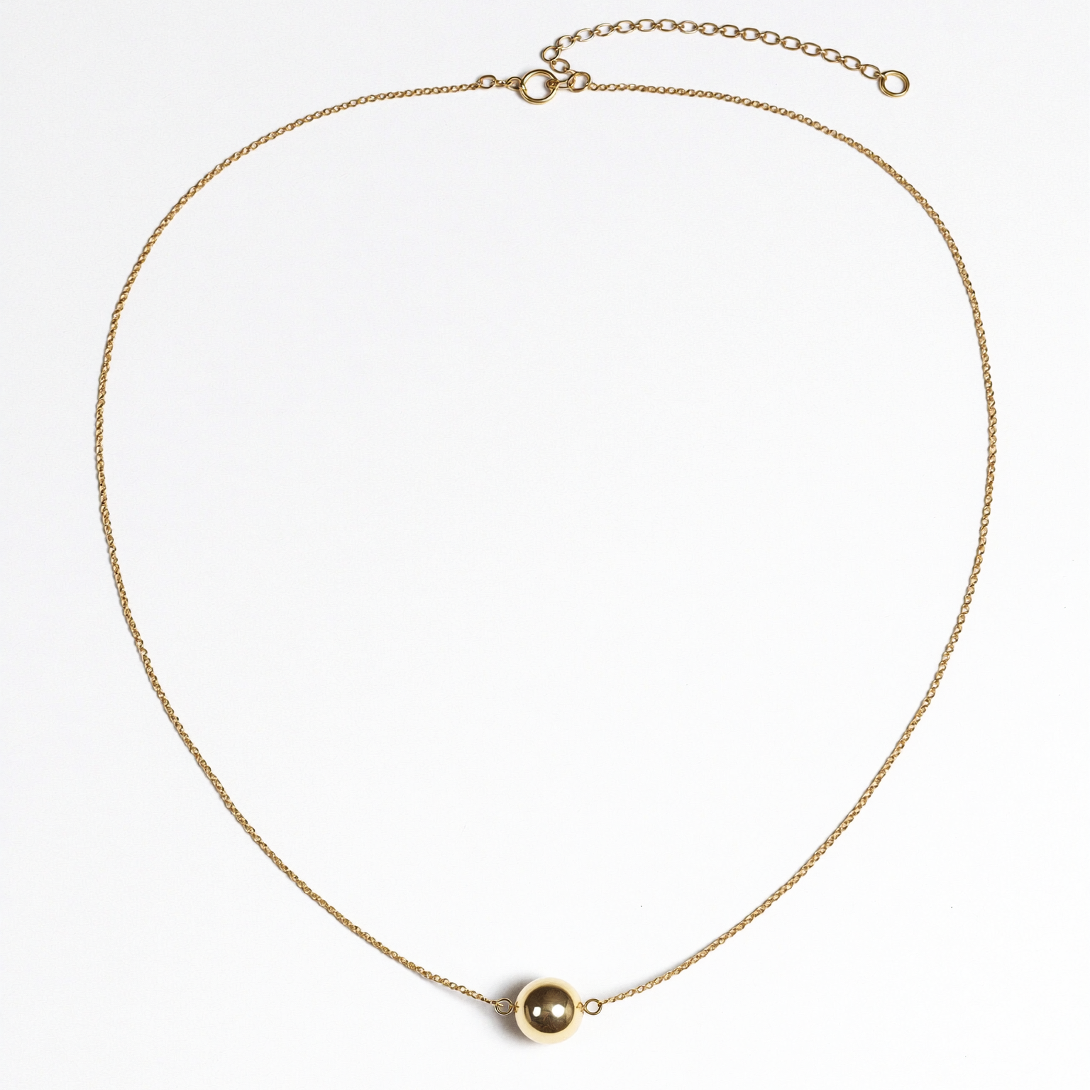 Whisper Chain Necklace dainty gold chain on neutral background, Caeli Jewelry hypoallergenic 316L surgical steel